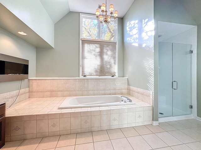 bathroom featuring tile patterned flooring, independent shower and bath, vaulted ceiling, an inviting chandelier, and vanity