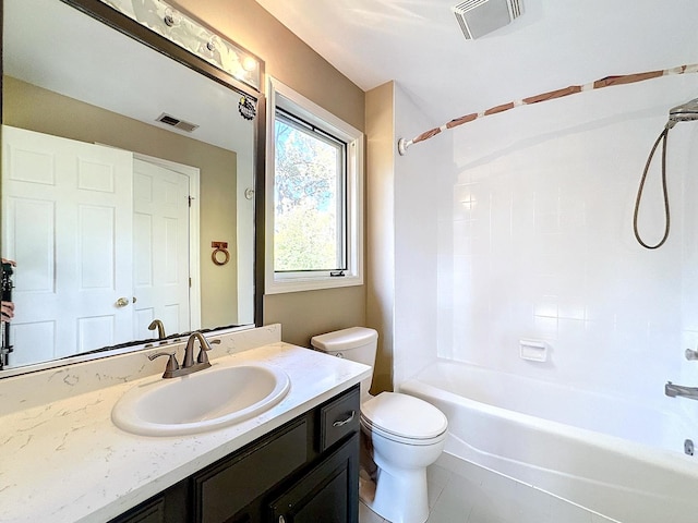 full bathroom with vanity, shower / tub combination, toilet, and tile patterned flooring