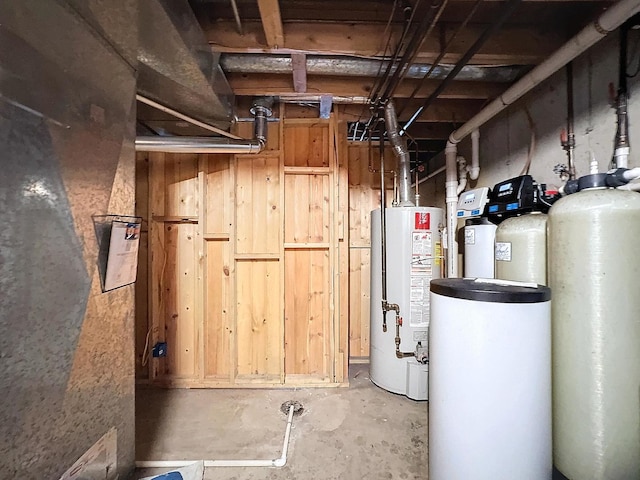 utility room featuring gas water heater