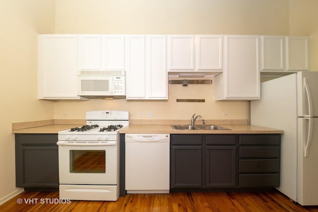 1645 W Ogden Ave Unit 434, Chicago, IL 60612 - kitchen with white appliances, a sink, white cabinets, and light countertops