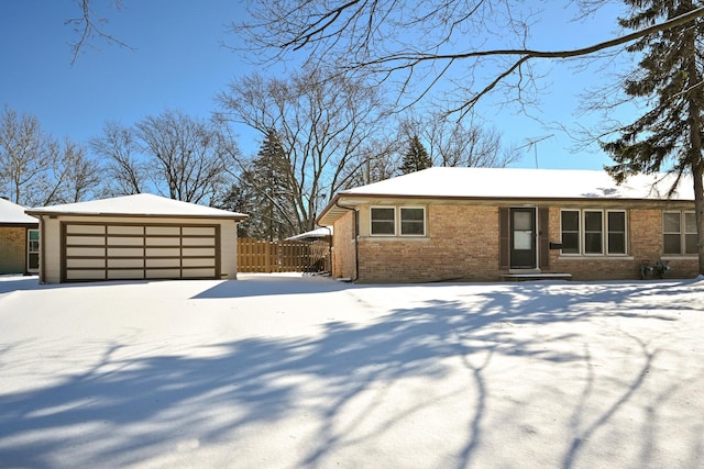 view of front of home featuring a garage and a front lawn