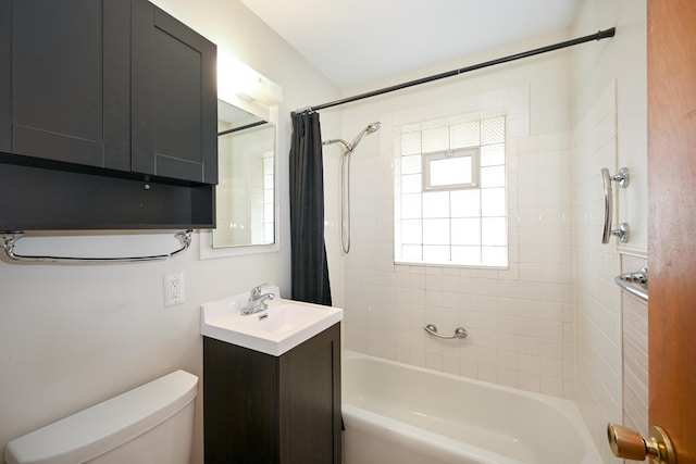 full bathroom with toilet, shower / bath combo with shower curtain, and vanity