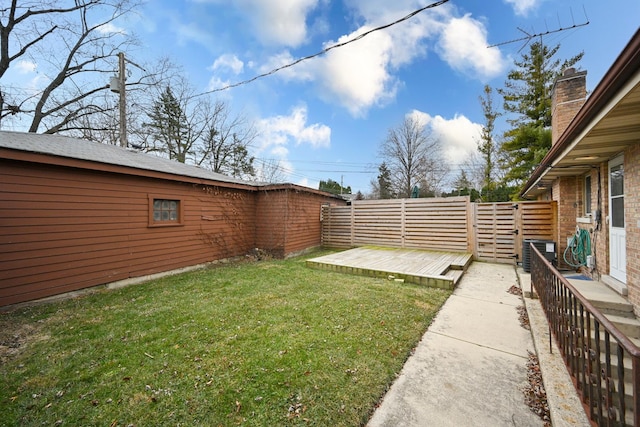 view of yard featuring a wooden deck