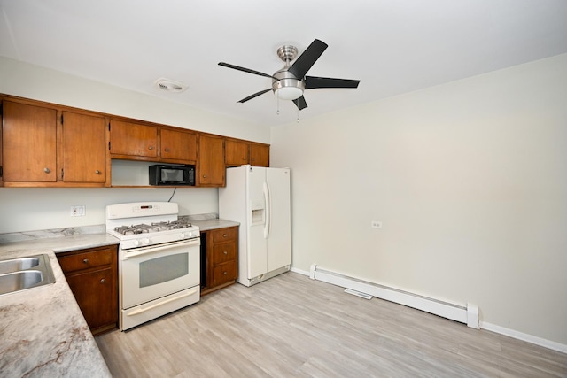 kitchen with a baseboard radiator, light wood-style flooring, white appliances, visible vents, and brown cabinetry