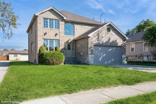 view of front of property with a front lawn and a garage