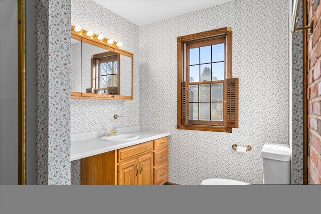 bathroom with vanity and toilet