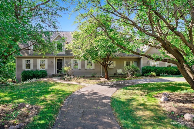 view of front of home with a front yard