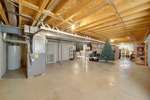 basement with heating unit and water heater