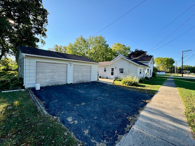 view of property exterior with a lawn