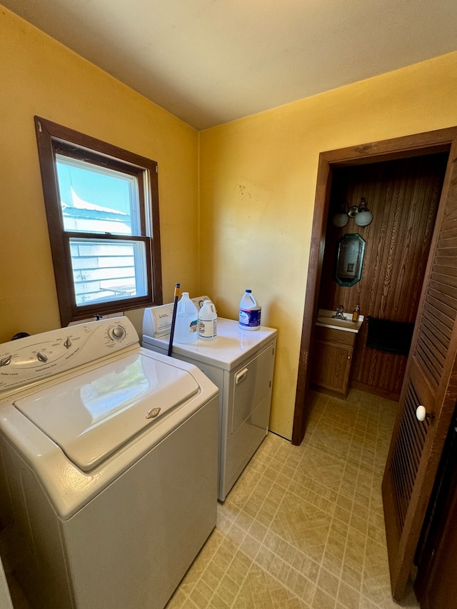 laundry area featuring independent washer and dryer