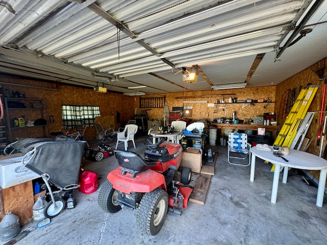 garage with a workshop area