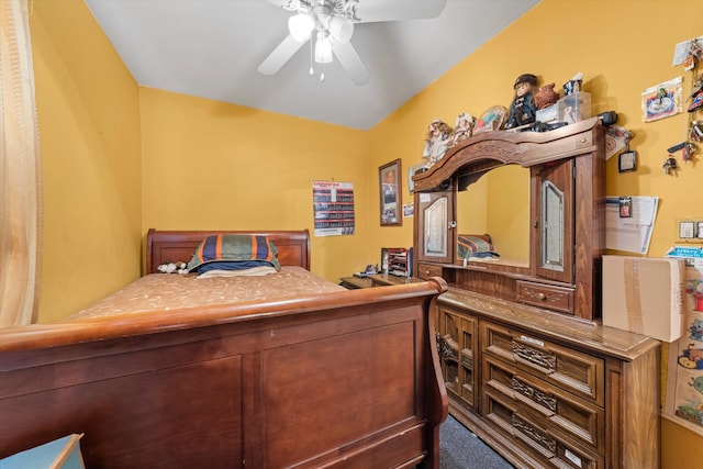 bedroom with ceiling fan and carpet flooring