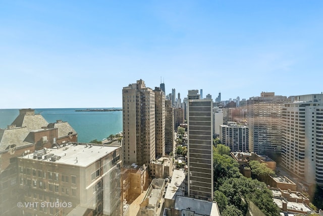 property's view of city featuring a water view