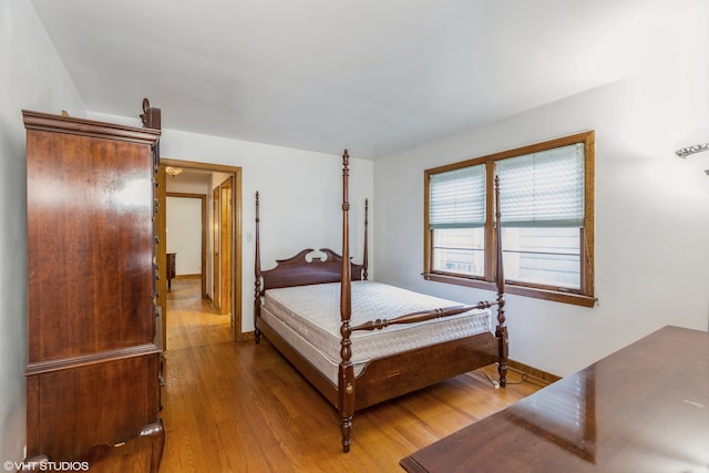 bedroom featuring wood-type flooring