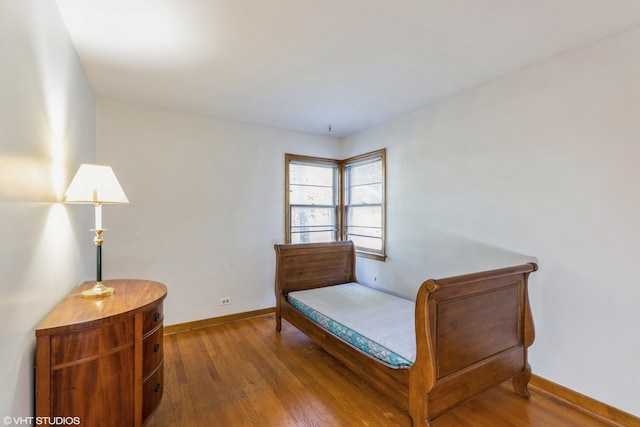 living area with hardwood / wood-style floors