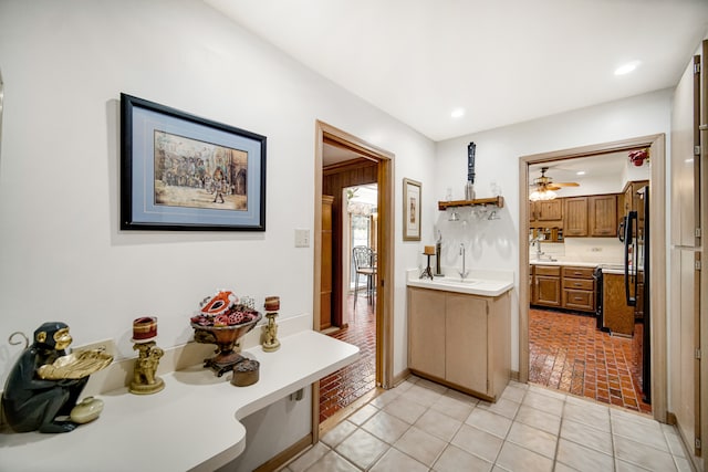 bathroom featuring vanity, ceiling fan, and tile patterned floors