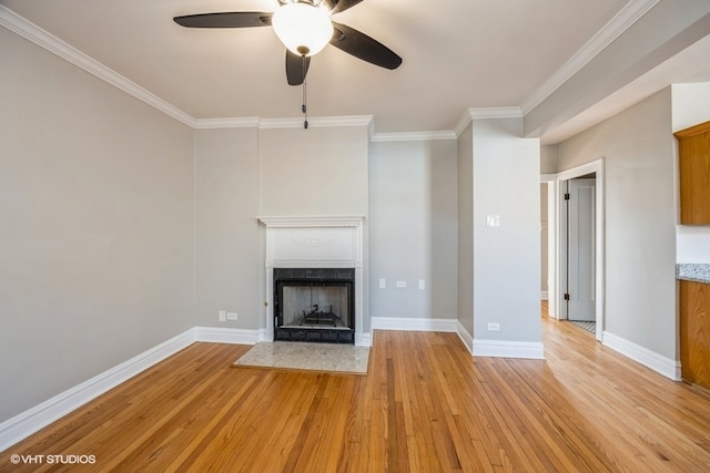 unfurnished living room featuring light wood-type flooring, crown molding, and ceiling fan