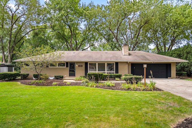 ranch-style house with a front yard and a garage