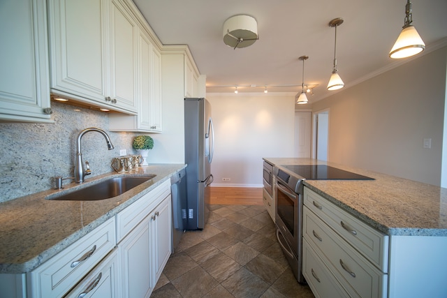 kitchen with light stone counters, sink, hanging light fixtures, stainless steel appliances, and crown molding