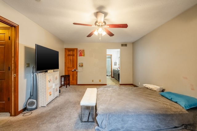 bedroom featuring ceiling fan and light colored carpet