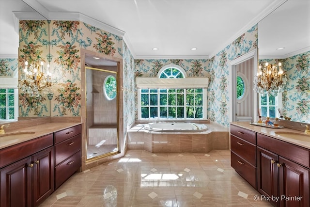 bathroom with ornamental molding, shower with separate bathtub, an inviting chandelier, and vanity