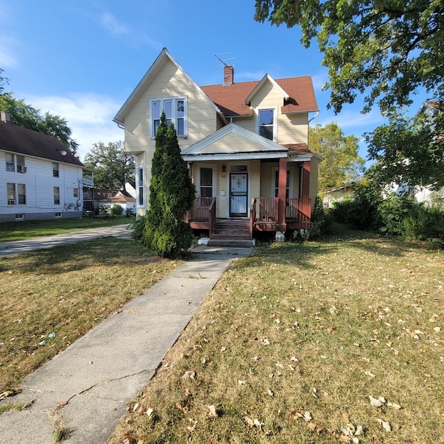 bungalow-style house featuring a front yard and a porch