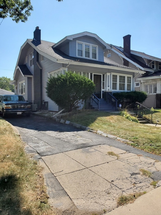 view of front of home with a front yard