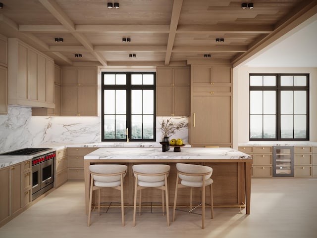 kitchen featuring beam ceiling, a kitchen island, a kitchen breakfast bar, and range with two ovens