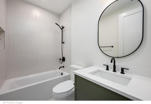 full bathroom featuring vanity, bathing tub / shower combination, and toilet