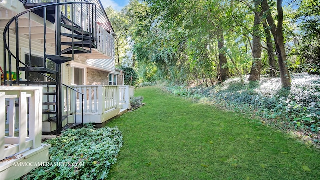 view of yard with a wooden deck