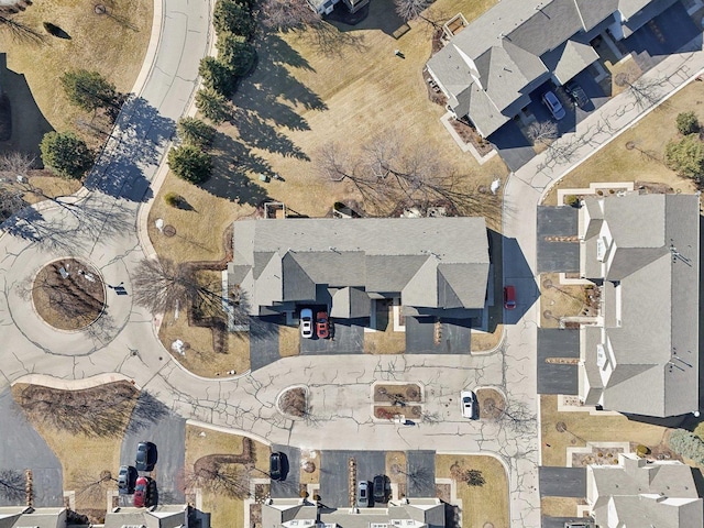 birds eye view of property with a residential view