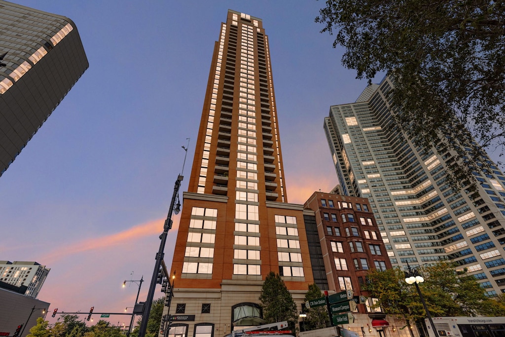 view of outdoor building at dusk