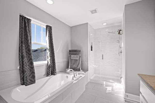 full bath with a shower stall, a garden tub, vanity, visible vents, and recessed lighting