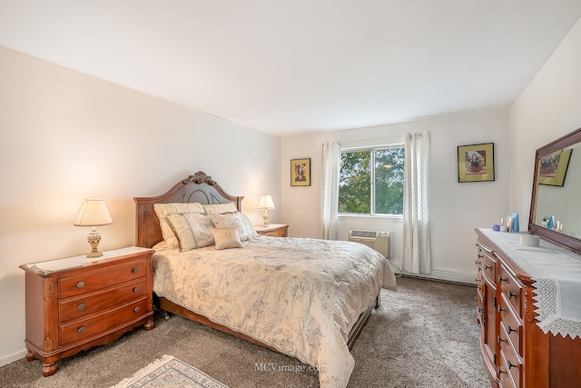 carpeted bedroom featuring a baseboard heating unit and a wall mounted AC