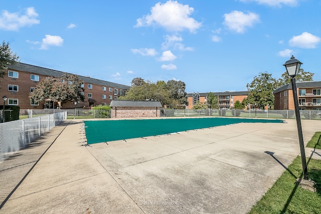 view of swimming pool featuring a patio