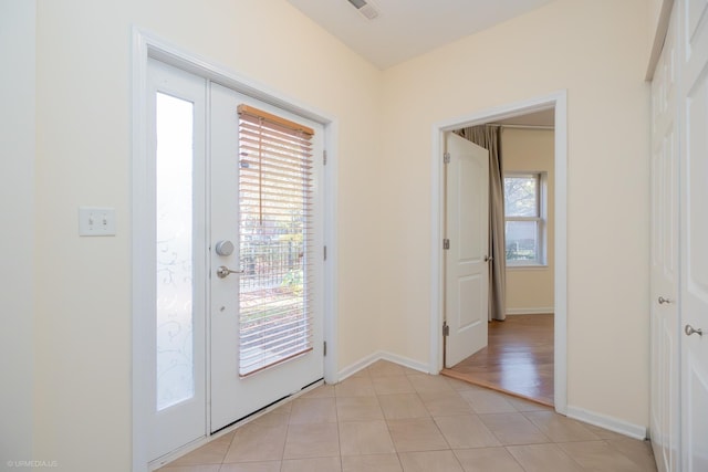 doorway to outside featuring light wood-type flooring