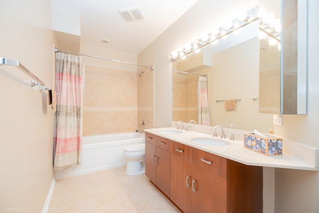 full bathroom with vanity, shower / bath combo, and toilet