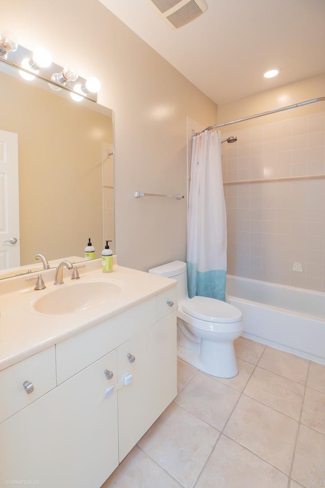 full bathroom with tile patterned flooring, vanity, toilet, and shower / bathtub combination with curtain