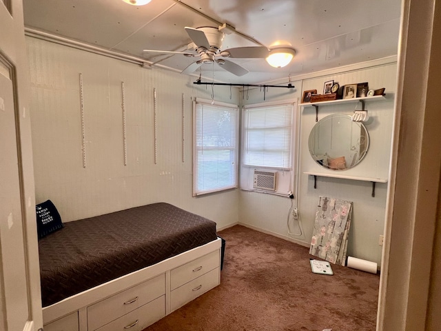 bedroom featuring ceiling fan, cooling unit, and carpet flooring