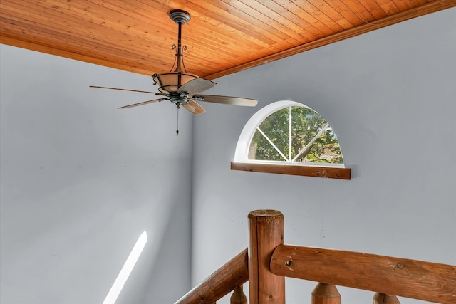 room details featuring wood ceiling, ornamental molding, and ceiling fan