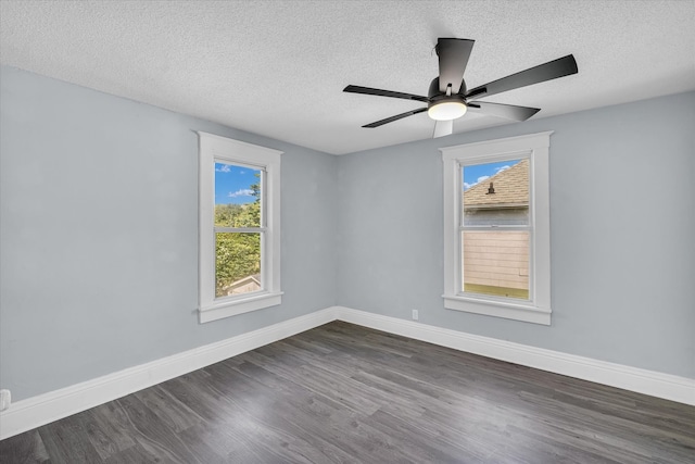 unfurnished room with ceiling fan, a textured ceiling, and dark hardwood / wood-style flooring