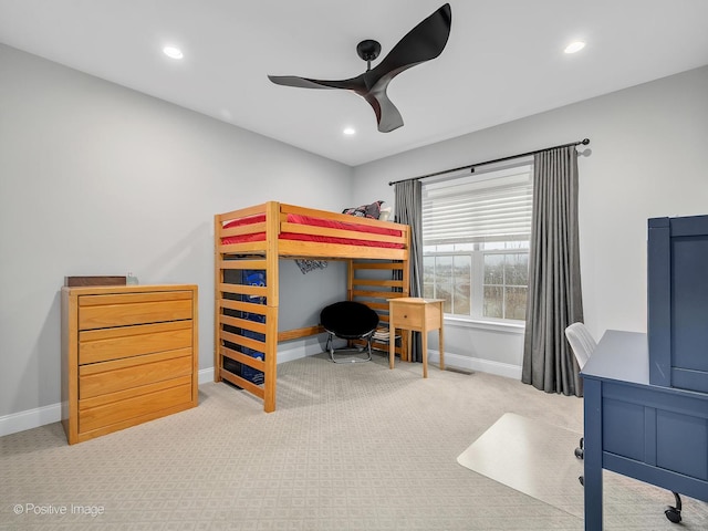 bedroom with ceiling fan and carpet flooring