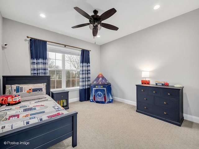 carpeted bedroom with ceiling fan