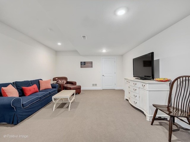 living room featuring light carpet