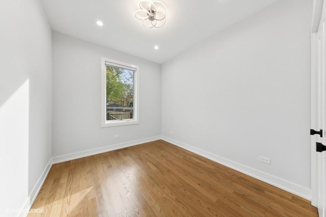 empty room with light wood-type flooring