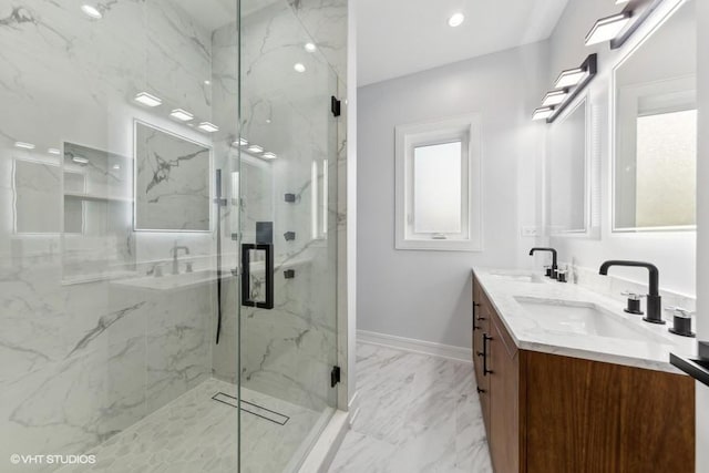 bathroom featuring vanity and a shower with shower door