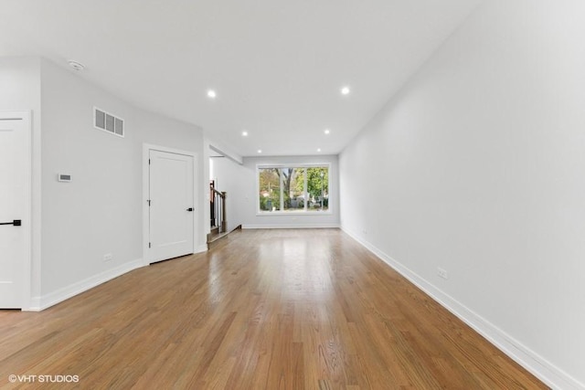 unfurnished living room with light hardwood / wood-style flooring