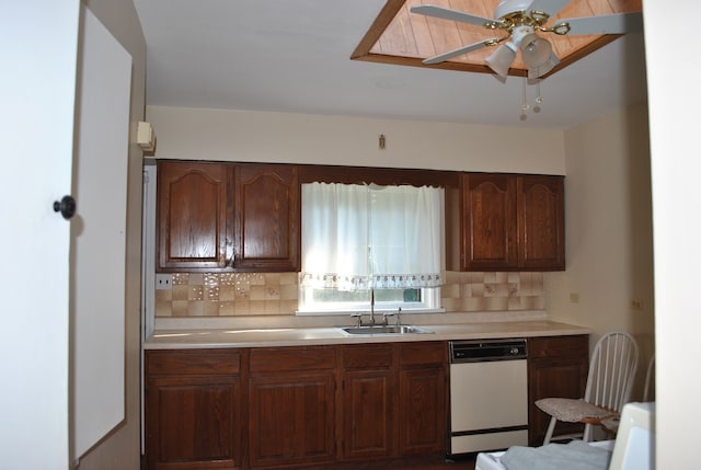 kitchen with ceiling fan, dishwasher, sink, and decorative backsplash