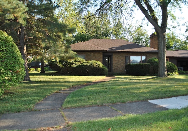 view of front of home with a front yard