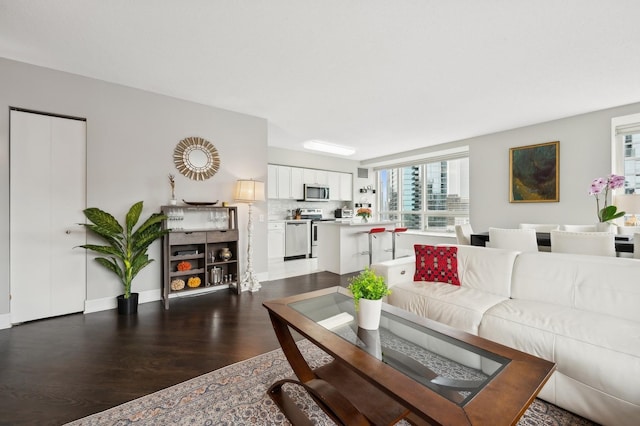 living room featuring dark hardwood / wood-style floors